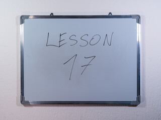 Whiteboard showing LESSON concept representing teaching, explanation and educational content