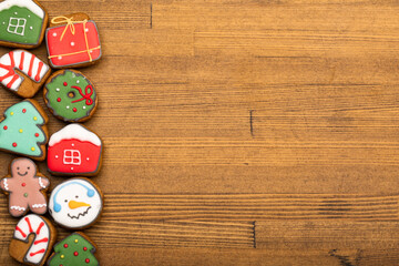 Christmas gingerbread cookies on wooden table