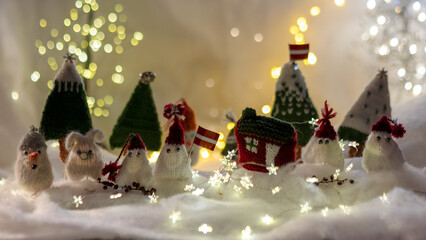 Christmas decorations from various knitted items, gnomes, snowmen, trees and houses, beautiful card, festive mood