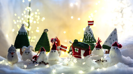 Christmas decorations from various knitted items, gnomes, snowmen, trees and houses, beautiful card, festive mood