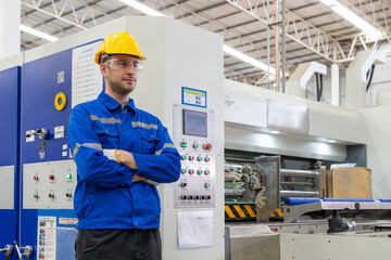 Engineer paper cardbox container factory in professional uniform check and analyse paper industrial...