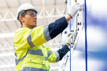 Engineer paper cardbox container factory in professional uniform check and analyse paper industrial...