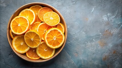 Freshly cut orange slices arranged in a bowl