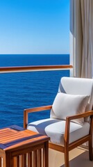 Fototapeta premium A seaside balcony with a wooden chair and small table overlooks a calm blue ocean beneath a bright, clear sky