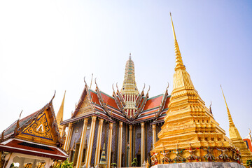Fototapeta premium Wat Phra Kaew or Wat Phra Sri Rattana Satsadaram is temple used for various royal ceremonies during reign of King Rama I. It is temple within the Grand Palace. Inside temple is the Emerald Buddha.