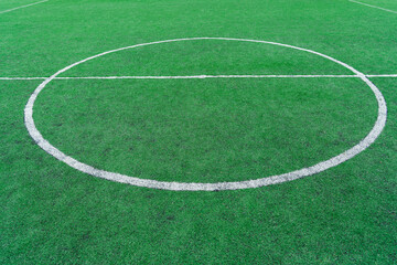 Obraz premium center, midfield. textured soccer game field - Training camp with a small soccer stadium and playing field.