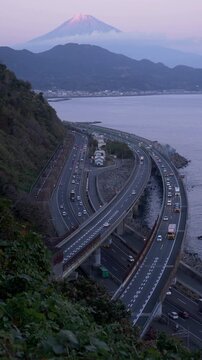 Mount Fuji over Highways Captured at Satta Pass, Shizuoka City (Vertical Timelapse/Static Shot)