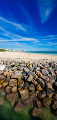 Large scale vertical panorama Miami Beach jetty rocks