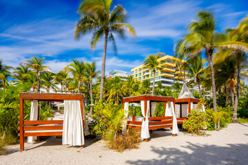 Miami Beach cabanas with palms. Long exposure setting