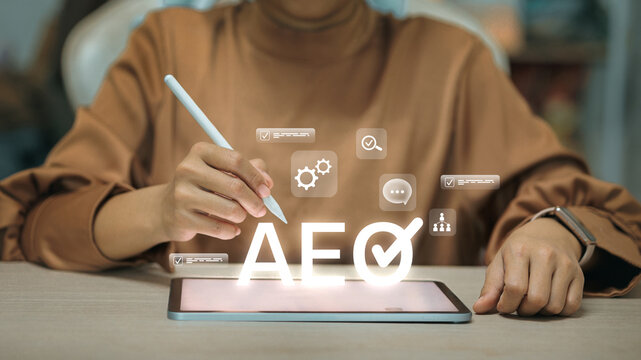 Businesswoman Using Tablet with AEO Certification and Supply Chain Icons