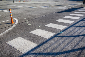 Public parking lot at a roof wih crosswalk, safety concept