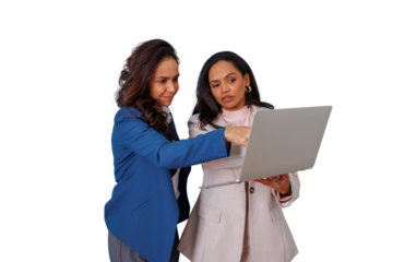 Businesswomen collaborating on laptop, discussing project details and sharing ideas, fostering teamwork and mentorship