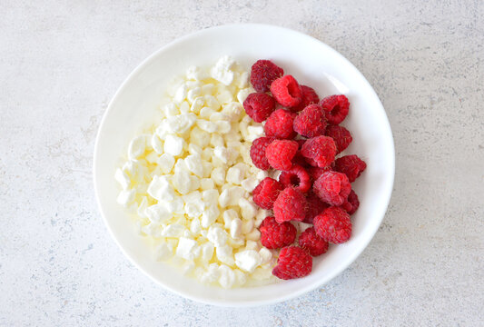 Cottage Cheese and Raspberries on a Plate cut out healthy food