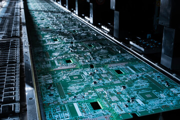 Electronic circuit boards moving along an automated smt production line, symbolizing advanced manufacturing, automation, innovation, and high-tech industry development
