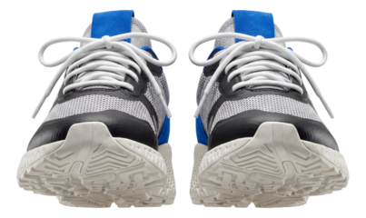 Low-top athletic shoes featuring a contrasting heel tab and textured midsole.