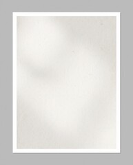 Abstract light and shadow patterns on a textured paper surface