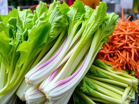 Crisp celtuce stalks at market stall, nutritious, crunchy, raw, stir-fry, salad ingredient, celtuce,  salad