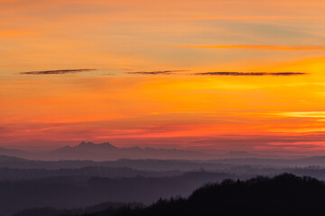 Fototapeta premium Sunset over Tatra Mountains seen from 150 km