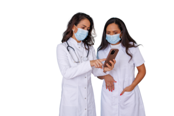 Female doctors wearing face masks discussing online healthcare solution on mobile phone, transparent background