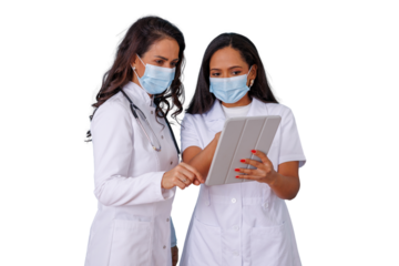 Two doctors wearing surgical masks focused on a digital tablet, discussing medical data and teamwork in healthcare, transparent background