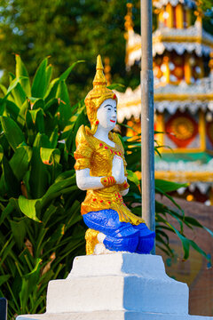 Statue of Thep Phanom, a devata in a praying position (wai) in the Wat Chong Klang temple, Mae Hong Son, Northern Thailand