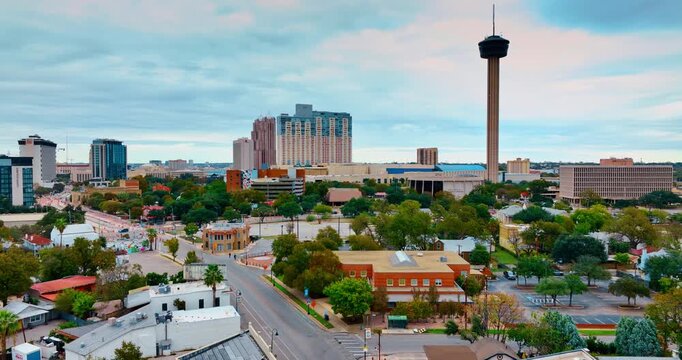 Beautiful green Hemisfair district in San Antonio, Texas, USA. Approaching the Tower of Americas overpeering over the scenery.