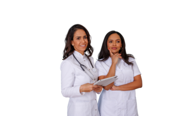 Diverse women doctors and healthcare professionals standing, collaborating and planning with a tablet, showing team support and innovation