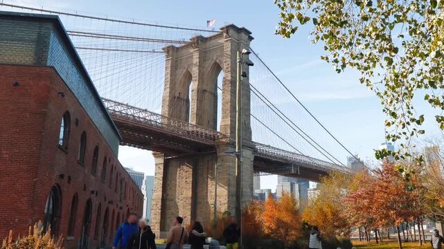 Scenic Brooklyn Bridge at autumn in New York, USA. 4K.