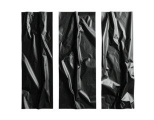 Three vertical sections of crumpled dark material, contrasting light and shadow on a dark backdrop