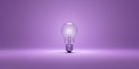 Halogen light bulb on purple background, energy efficiency for lighting design