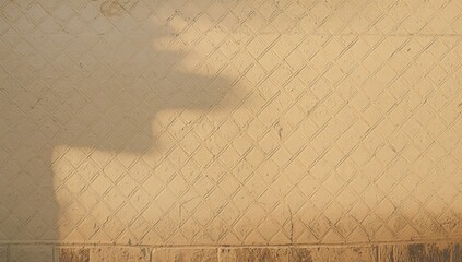Decorative painted diamond pattern on a domestic building wall, emphasizing traditional craftsmanship