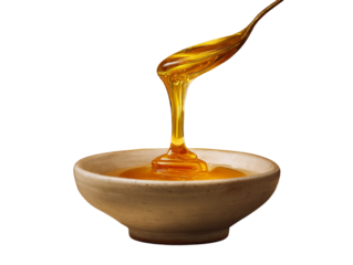 Agave nectar stream pouring into a small ceramic bowl with amber glow