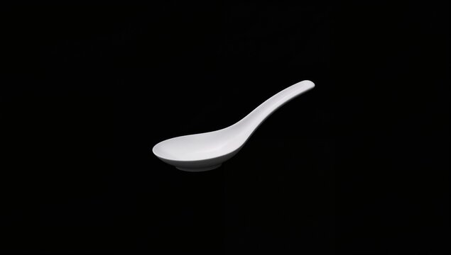 White rice with a spoon on dark background, used for culinary or nutritional content, World Food Day
