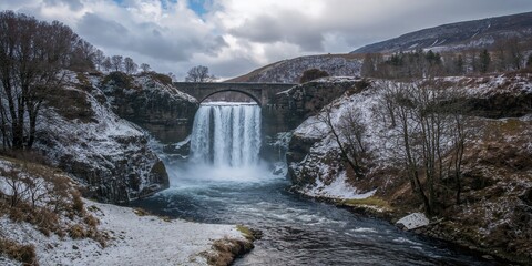 Winter waterfall in Dumfries and Galloway, Scotland, seasonal erosion risk