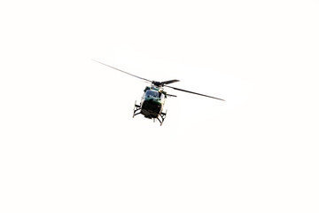 Military helicopter flying on isolated white background