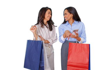 Two smiling female friends enjoying a shopping trip, holding bags and interacting with a phone, discussing their experience