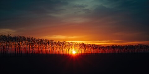 Obraz premium Sunset gradient scene with landscape silhouette, suitable for background or layout purposes, highlighting natural hues