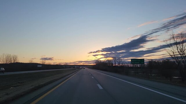 Sunrise or sunset on the highway