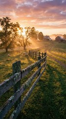 Obraz premium Serene Sunrise Over Farm Landscape with Fencing and Misty Horizon