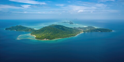 Pulau Selakan, the most populated island of the Tun Sakaran Marine Park, showing coastal settlement and marine environment