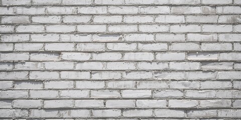 Obraz premium Close-up of a white brick wall with unevenly laid bricks used as a textured background for text or design elements