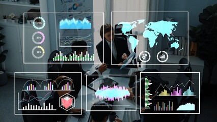 Business meeting with diverse professionals analyzing data through modern digital interfaces and interactive visualizations in an office space Gluon.
