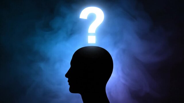 Human head silhouette with glowing question mark representing thought