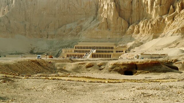 Groups of tourists near the ancient Egyptian temple of Hatshepsut in Luxor, Egypt. A historical landmark of Egypt during the time of the pharaohs.