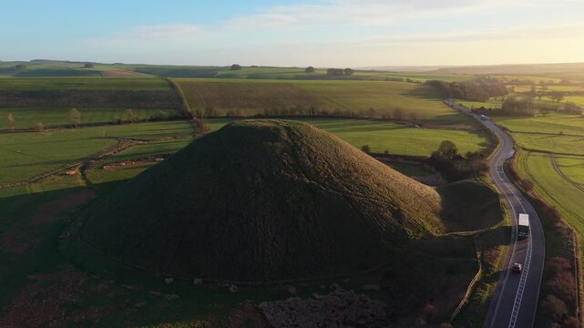 Aerial View of Silbury Hill Prehistoric Monument in Wiltshire on a Sunny Morning