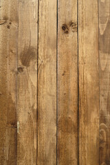 Retro style vintage brown painted wooden texture boards as background vertical front view close-up