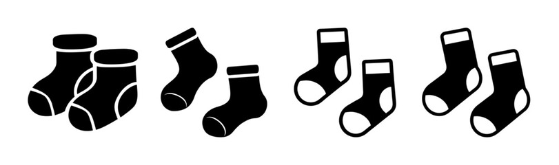 A graphic representation of several black socks in various styles and arrangements on a white background © Suriya