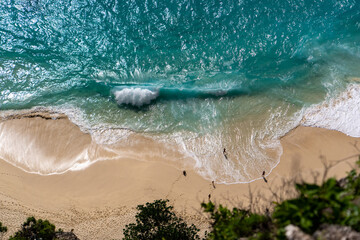 Aerial Top-Down View of a Beach with Gentle White Foamy Waves High quality photo