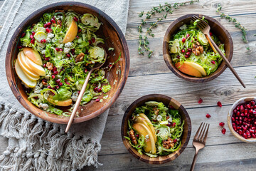 Servings of a freshly made Brussels Sprouts salad, ready for eating.