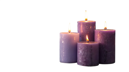 three candles on a black background